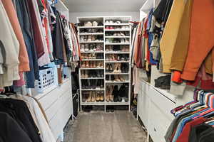 Spacious walk-in closet, carpeted