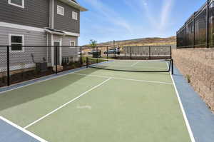 HOA Pickleball Court featuring a mountain view