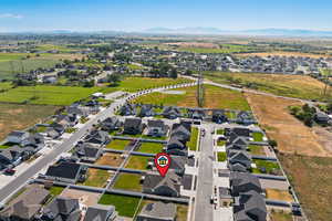 View of property location with a mountain backdrop and nearby suburban area