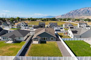 Aerial view of residential area with a mountainous background