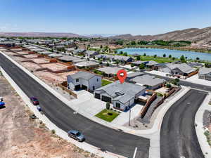 Aerial view of residential area featuring a water and mountain view