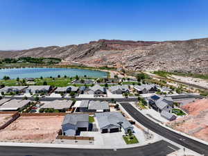Aerial perspective of suburban area featuring a water and mountain view