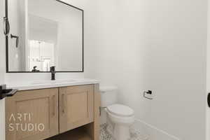 Bathroom with vanity and tile patterned floors