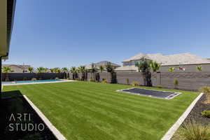 View of fenced backyard