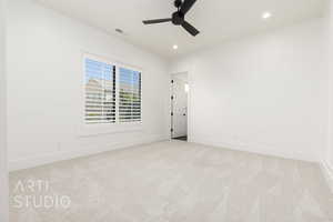 Empty room with carpet floors, ceiling fan, and recessed lighting
