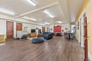 Living area featuring dark wood finished floors