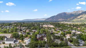 Aerial view of residential area with a mountainous background