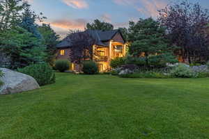 View of front of property featuring a front lawn