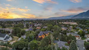 Aerial view at dusk of a mountain view and a residential view