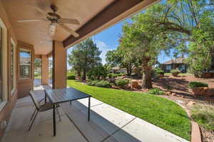 View of patio with ceiling fan
