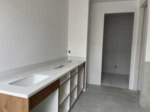Bathroom featuring double vanity
