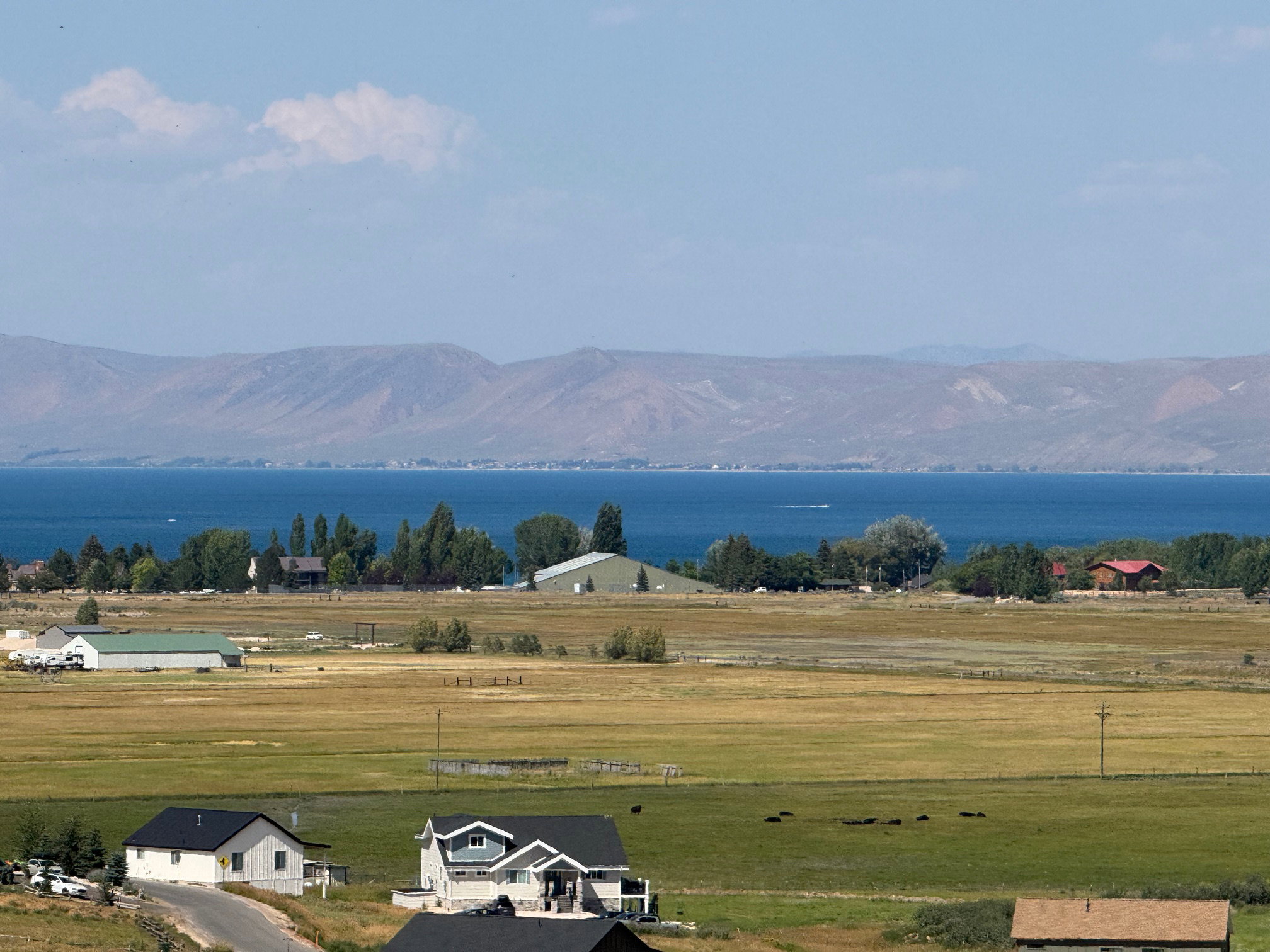 View of mountain backdrop featuring rural landscape