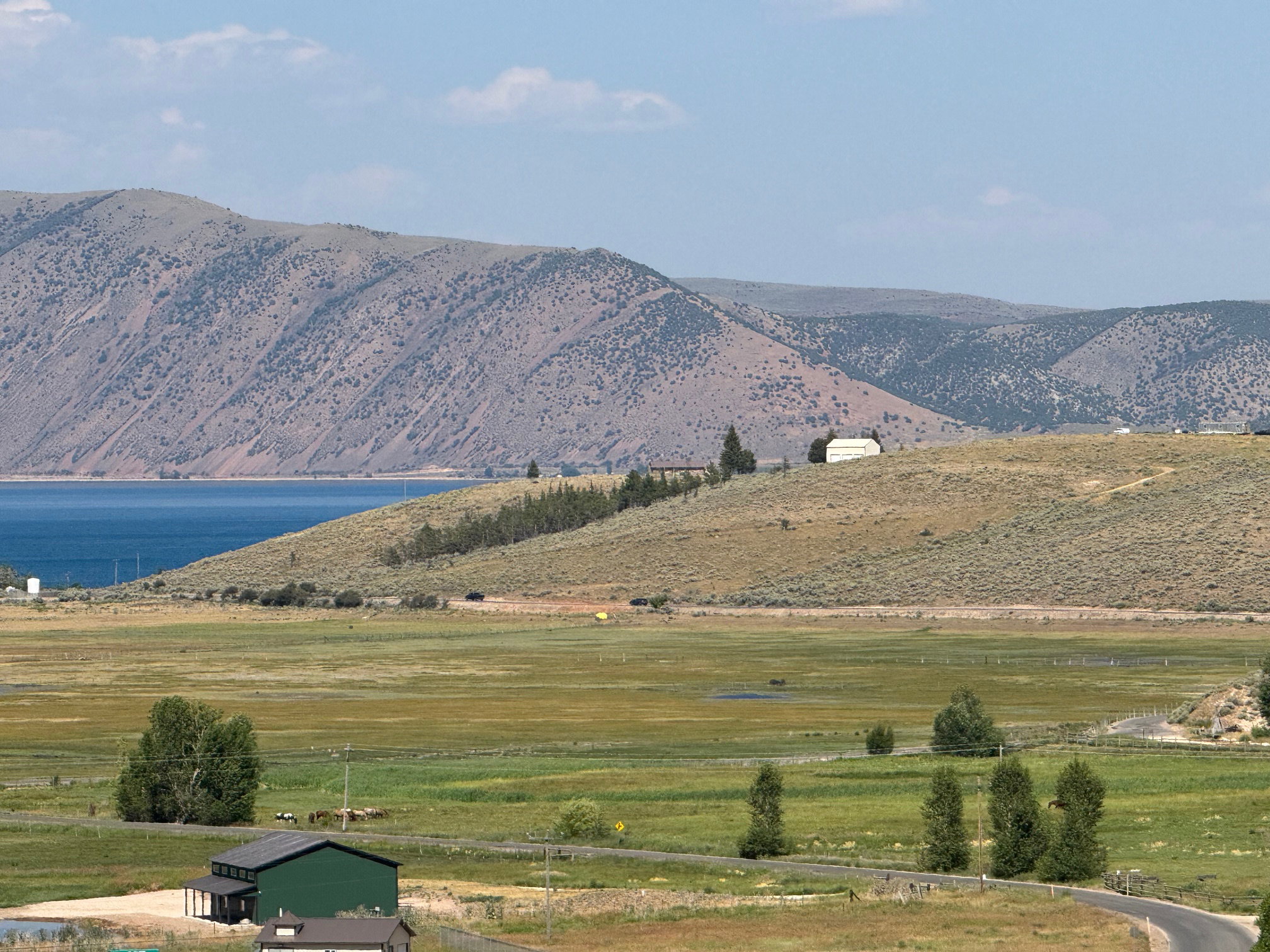 View of mountain backdrop with a large body of water