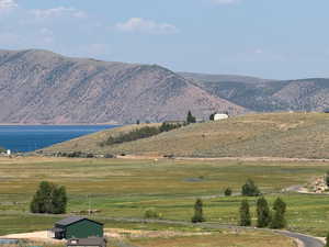 View of mountain backdrop with a large body of water