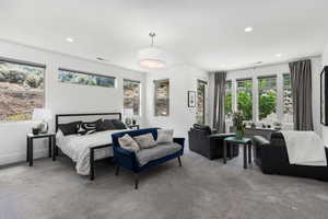 Bedroom with multiple windows, carpet, and recessed lighting