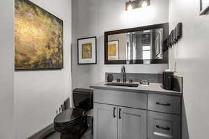 Bathroom with vanity and toilet