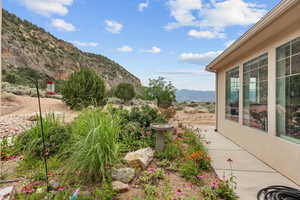 View of yard with a mountain view