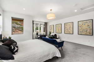 Bedroom featuring recessed lighting, attic access, and carpet flooring