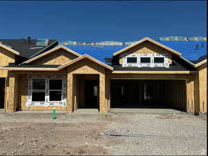 Property in mid-construction with a garage