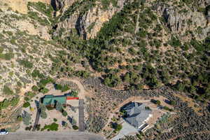 Aerial view of property and surrounding area featuring rural landscape and a desert landscape