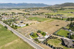 View of property location featuring mountains and rural landscape