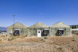 View of greenhouse with a mountain view