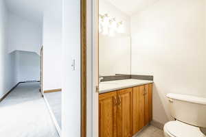 Bathroom with toilet and vanity
