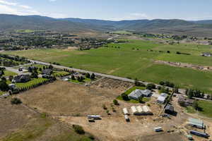 View of property location featuring rural landscape and a mountain backdrop