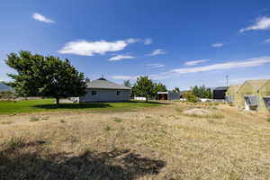 View of yard with an outbuilding