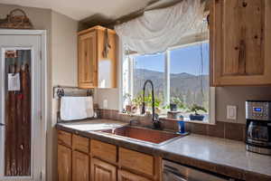 Kitchen featuring a mountain view and dishwasher