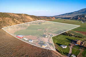View of rural area featuring property parcel outlined and a mountain backdrop