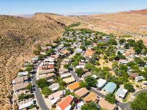 Aerial view of residential area featuring a mountain backdrop