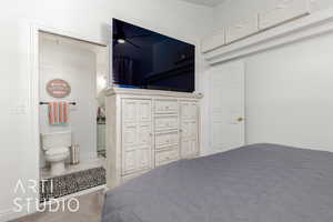 Bedroom featuring ensuite bath