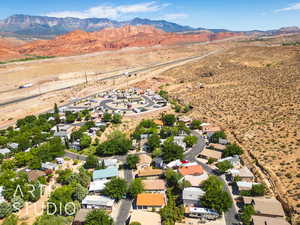 Drone / aerial view of a mountainous background and a desert landscape
