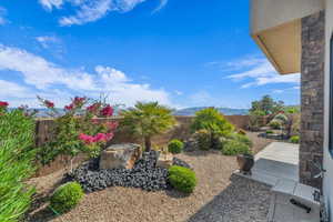 Fenced backyard featuring a patio area