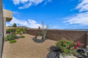 View of fenced backyard