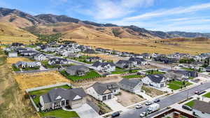 Aerial view of residential area featuring mountains