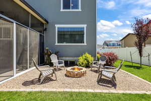 View of patio / terrace with an outdoor fire pit