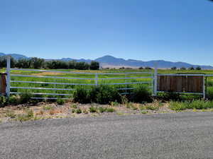 View of mountain background with rural landscape. Main gate access