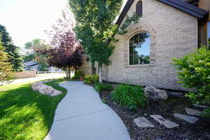 View of side of property featuring brick siding