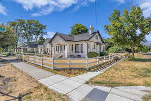 View of front facade featuring the large corner lot.