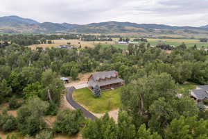 Overview of rural landscape featuring a mountain backdrop