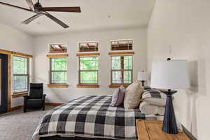 Bedroom featuring multiple windows, carpet flooring, ceiling fan, and recessed lighting