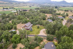 View of property location featuring mountains and rural landscape