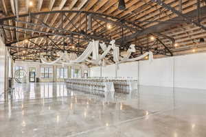 Misc room with high vaulted ceiling