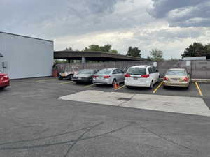 View of partially covered parking lot