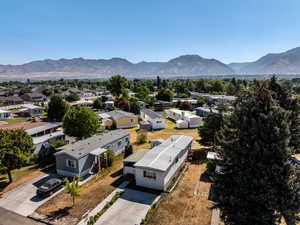 Aerial perspective of suburban area with mountains