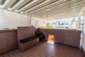 Wooden terrace featuring a mountain view