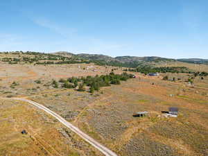 Overview of rural landscape featuring a mountain backdrop