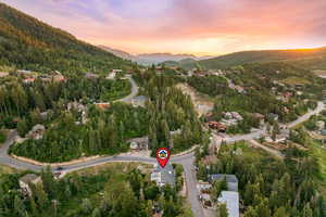 Aerial view at dusk of a mountain view and a forest view